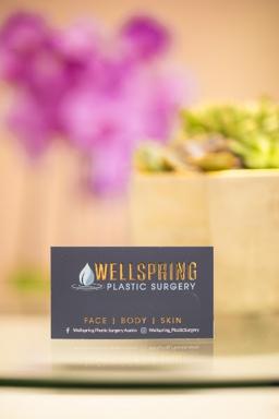 Wellspring Plastic Surgery logo